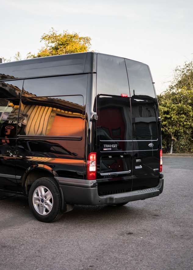 Rear of Ford Transit van with shiny paintwork after paint correction, ceramic coating, detailing, paintwork enhancement and paintwork protection