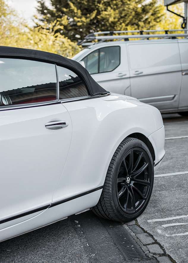 Bentley Continental GT car with tinted windows from side