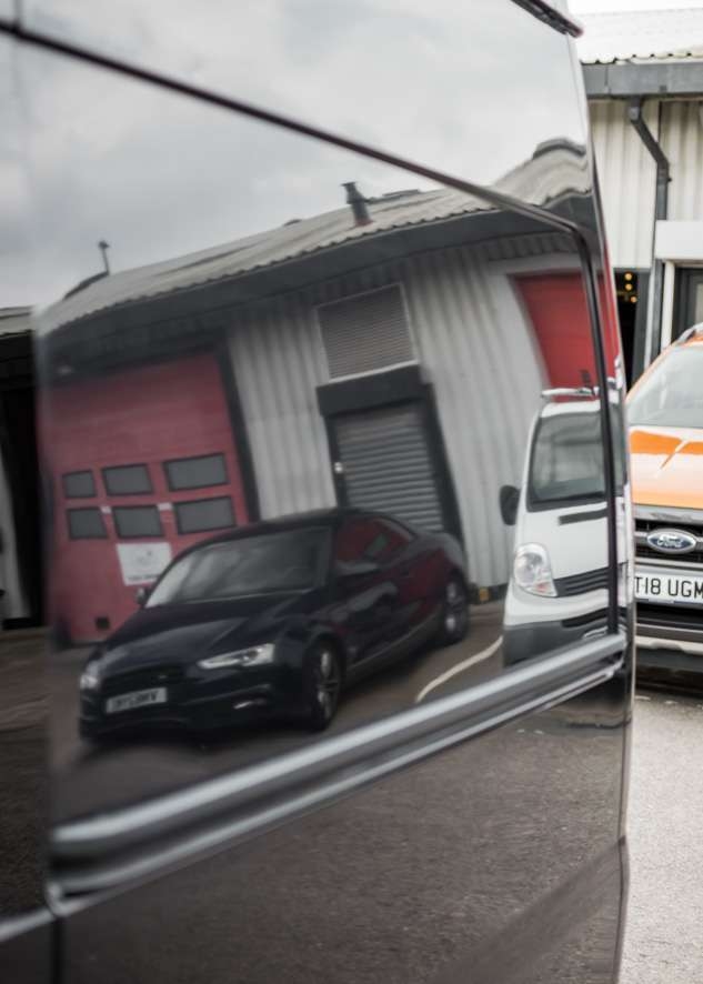 Close up shot of poor/bad/dull paintwork before polishing on Ford Transit van 