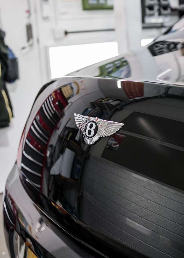 Shiny boot of Bentley Flying Spur car after scratches removed by paint correction, paint correction and Paintwork Enhancement