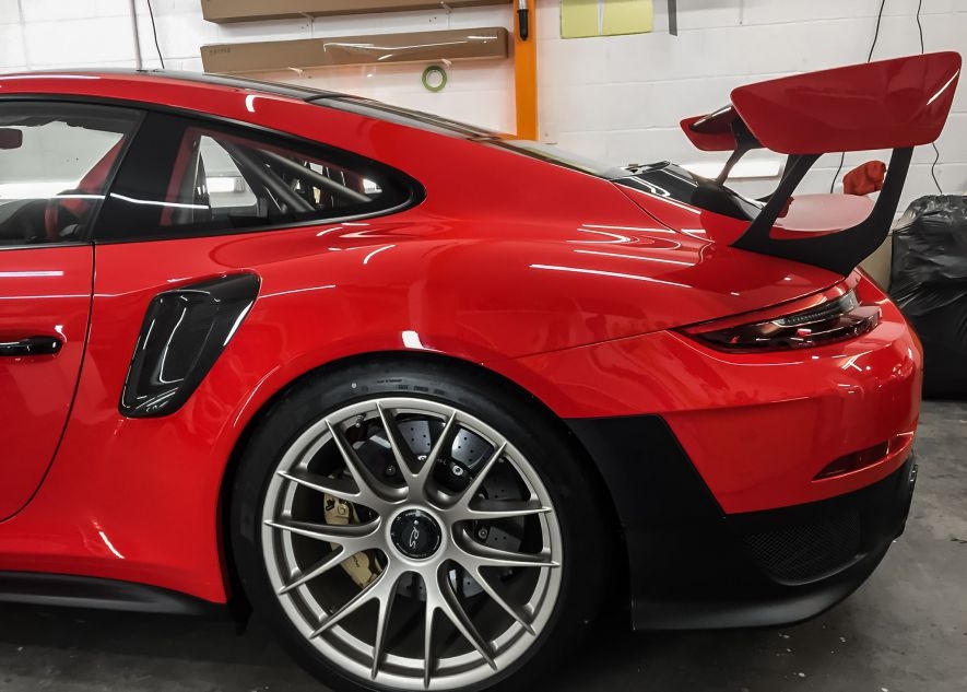 Paint protection film on Porsche 911 GT2RS red car