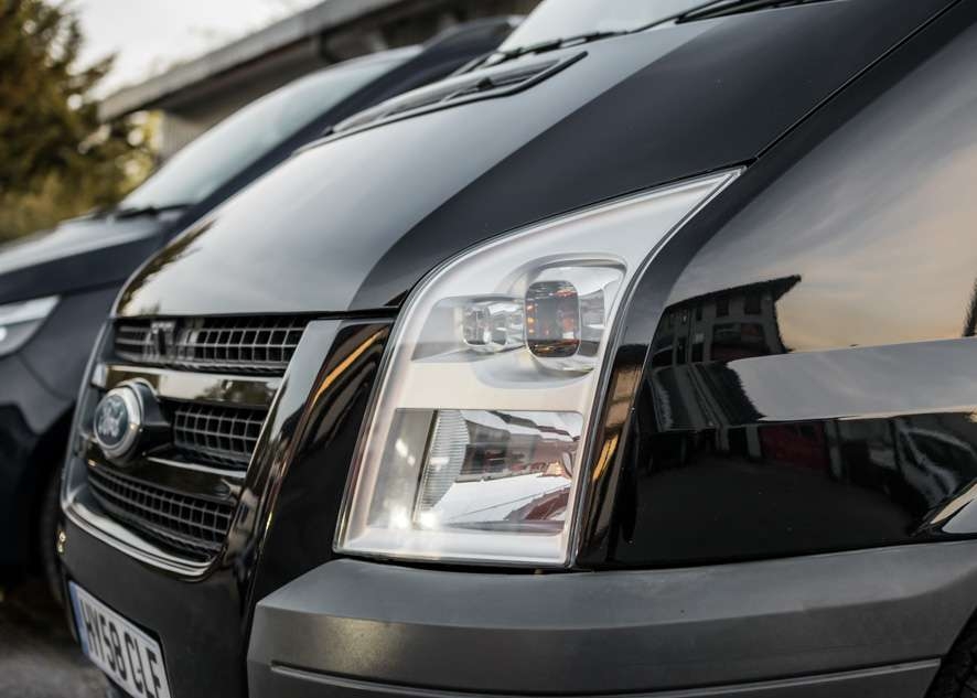 Close up shot of Ford Transit van headlights with fog/cloudiness removed after headlight restoration