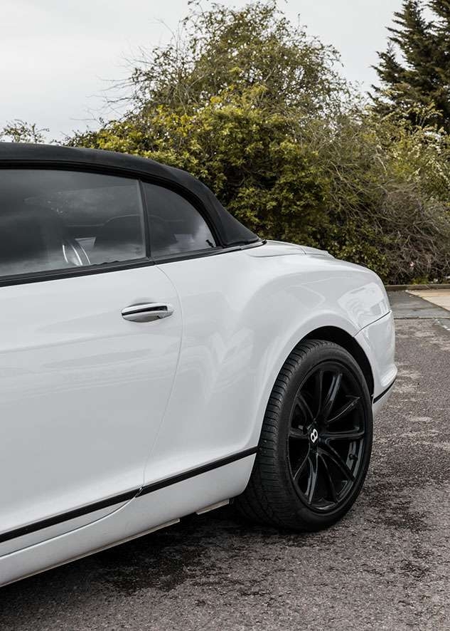 Bentley Continental GT car with untinted windows from side