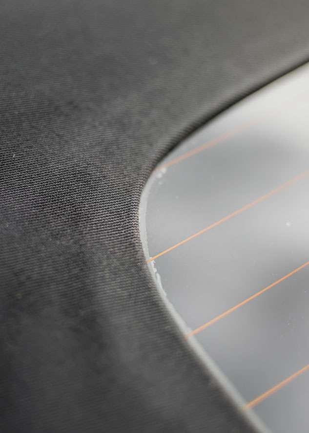 Close shot of badly done window tint on Bentley Continental GT car