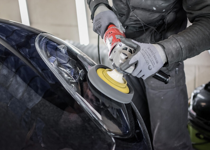 Car lights going through headlight restoration service