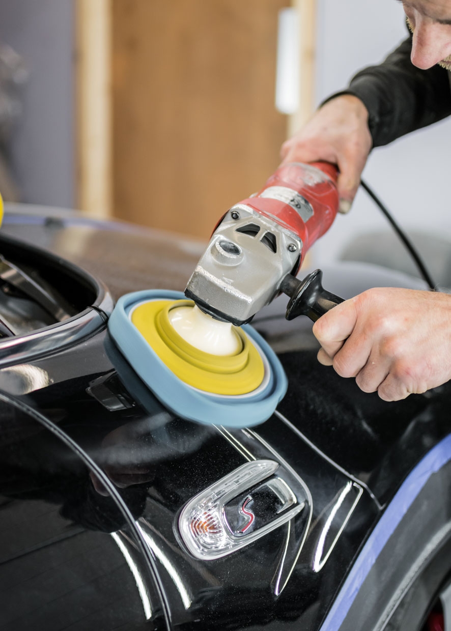 Car being machine polished