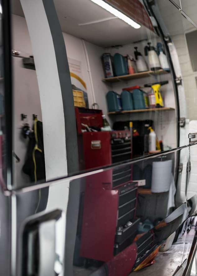Close up shot of shiny paintwork on Ford Transit van with no scratches