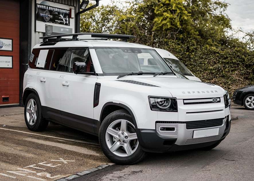 White Land Rover Defender with tinted windows after window tinting