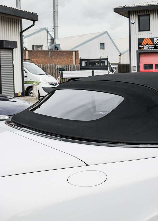 Close shot of Bentley Continental GT car with untinted windows from front