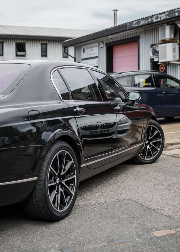 Rear side shot of Bentley Flying Spur car before Paint Correction, Paintwork Enhancement, Paint Correction, Headlight Restoration services